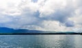 Lake George from the paddle boat during rain storm and clouds. Royalty Free Stock Photo