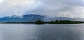 Lake George from the paddle boat during rain storm and clouds. Royalty Free Stock Photo