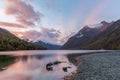 Lake Gunn at sunrise with beautiful sun rays, Fiordland, New Zealand