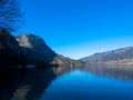 Lake Hallstatt with Dachstein Mountains against blue sky. Royalty Free Stock Photo