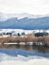 Lake Hayes with snow mountain reflections Royalty Free Stock Photo