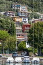 View of buildings and boats along the shore of Lake Iseo in Lombardy on August 15, 2020. Royalty Free Stock Photo