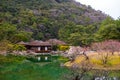 Lake and Japanese building in Ritsurin Garden, taken in winter Royalty Free Stock Photo