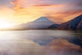 Lake kawaguchiko and Mount fuji morning mist sunrise light travel in japan Royalty Free Stock Photo