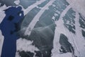 Lake Khubsugul is covered with ice and snow strong cold thick clear blue ice. Lake Khubsugul is a frosty winter day. Amazing