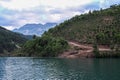 Lake Komani, Albania - May 18, 2017: Onboard morning Lake Komani ferry from Fierza to Koman in Albania - picking up people at a 