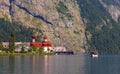 Lake of KÃÂ¶nigsee with st Bartholoma church Royalty Free Stock Photo