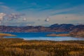 Lake Laberge and surrounding taiga in fall Royalty Free Stock Photo