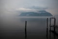 Lake - Lago Maggiore, Italy. Rainy day, misty fog.