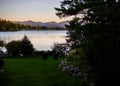 The lake in Lake Placid, with mountains in the sunset and fall colors Royalty Free Stock Photo