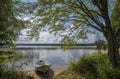 Lake landscape in Finland, boat and beach Royalty Free Stock Photo