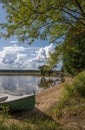 Lake landscape in Finland, boat and beach Royalty Free Stock Photo