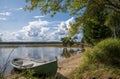 Lake landscape in Finland, boat and beach Royalty Free Stock Photo