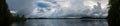 Lake landscape panorama and stormy sky