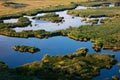 Lake landscape with shimmering waters, picturesque shoreline, serene surroundings, and stunning reflections. Nature photography,