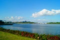 The lake landscape, under the blue sky and white clouds, is very beautiful Royalty Free Stock Photo