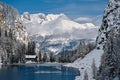 Tea House  at Lake Agnes in mountains covered with snow by blue alpine lake. Royalty Free Stock Photo