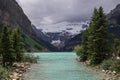 Lake Louise, Banff National Park, Alberta, Canada tourism. Snow covered Rocky Mountain lake landscape panorama without peopl Royalty Free Stock Photo