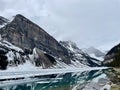 Lake Louise in Banff National Park in late May where it is partially frozen