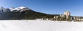 Lake Louise, CANADA - MARCH 20, 2019: frozen lake and mountains with snow peaks