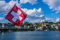 Lake Lucerne with swiss flag on foreground