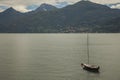 Lake Lugano, Switzerland - a boat and dark waters.