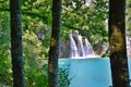 Lake with luminous azure-colored water and waterfalls. Plitvice Lakes, Croatia.