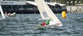 Girl overboard from racing dinghy. April 16, 2013: Editorial