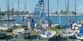 Children preparing racing dinghies at championships. April 18