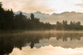 Lake Matheson in early morning with cloudy sky with mount cook Royalty Free Stock Photo