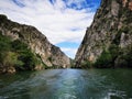 Lake in the Matka canyon - Macedonia. Mountains, emerald water, motor boats. Royalty Free Stock Photo