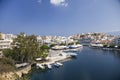 Lake in the middle of the city of Agios Nikolaos. A beautiful small town on the island of Crete, Greece.City architecture and Royalty Free Stock Photo