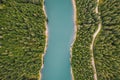Lake in the middle of the forest as seen from above. Bolboci Lake, Carpathian Mountains, Romania Royalty Free Stock Photo