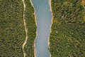 Lake in the middle of the forest as seen from above. Bolboci Lake, Carpathian Mountains, Romania Royalty Free Stock Photo