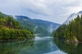 Lake and misty forest in mountains in a rainy day Royalty Free Stock Photo