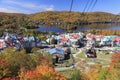 Lake and Mont Tremblant resort in autumn with cable car on the foreground Royalty Free Stock Photo