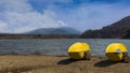 Lake Motosu, a green lake with two yellow kayaks on the shore