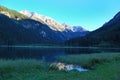 Lake in the mountains, beauty of nature, alpine landscape, mountains, blue sky, snow covered mountain peaks Royalty Free Stock Photo