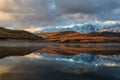 Lake mountains reflection snow sunrise Royalty Free Stock Photo