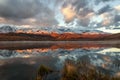 Lake mountains reflection snow sunrise Royalty Free Stock Photo