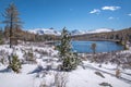 Lake mountains snow trees forest reflection autumn Royalty Free Stock Photo