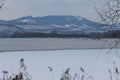 Lake Musov with the Church of St. Linharta in the Czech Republic in Europe. There is a reed around. Winter landscape and Palava