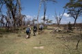 Tourists go on a walking safari on Crescent Island to see wildlife