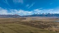 Lake Ohau farmland and the southern alps through alpine grasses and tundra terrain