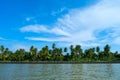 Lake and palms beatiful summer under a the blue sky take a boat to enjoy the view along the side of the river at meaklong river,