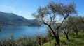 Lake panorama from `Monte Isola` with clouds. Italian landscape. Island on lake. View from the island Monte Isola on Lake Iseo, It Royalty Free Stock Photo