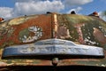 Chevrolet hood logo on an old rusty pickup Royalty Free Stock Photo