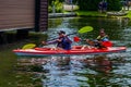 Kayaker enjoy summer day on Lake Placid in New York State`s Adirondack Mountains Royalty Free Stock Photo