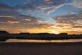 Lake Powell - Panoramic sunset view seen from Lone Rock Beach in Wahweap Bay in Lake Powell in Glen Canyon Recreation Area, Page Royalty Free Stock Photo