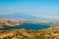 The lake of Pozzillo, with volcano Etna in background Royalty Free Stock Photo